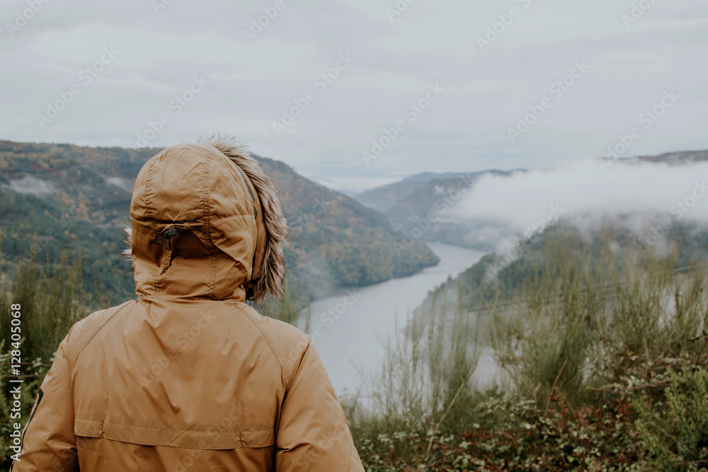 portrait of traveller in the Valley with a river portrait of traveller in the Valley with a river