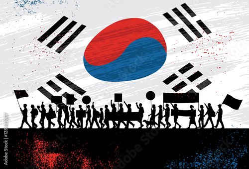 Silhouette group of people protesting with Flag of South Korea as a background