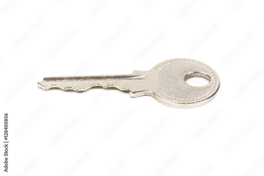 One silver key isolated on white background One silver key isolated on white background