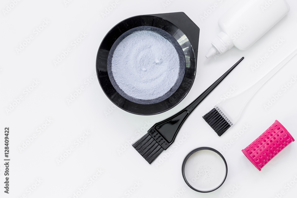Tools for hair dye and hairdye top view white background Tools for hair dye and hairdye top view white background