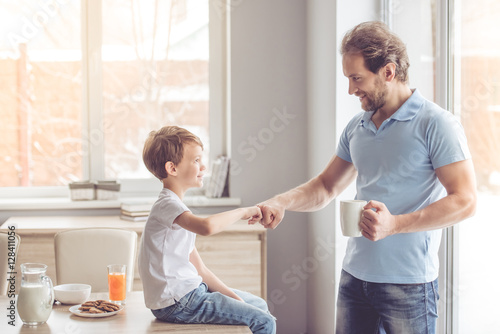 Father and son in kitchen