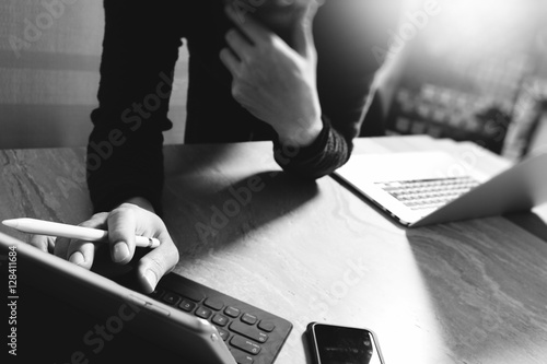 Naklejka Website designer working digital tablet dock keyboard and comput
