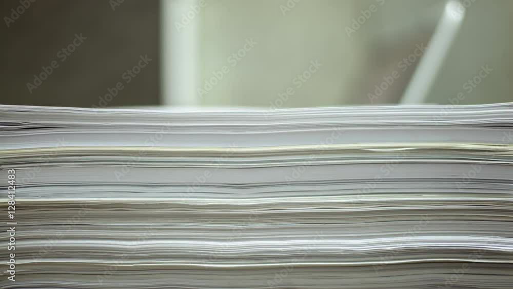 papers drop, working on laptop with document papers drop, working on laptop with document
