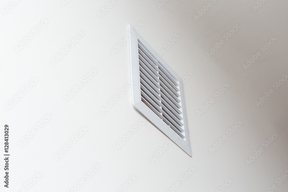 Close up of vent on the white wall Close up of vent on the white wall