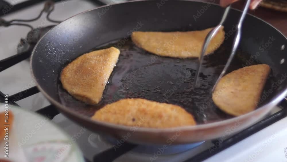 Video chef frying breaded products Video chef frying breaded products