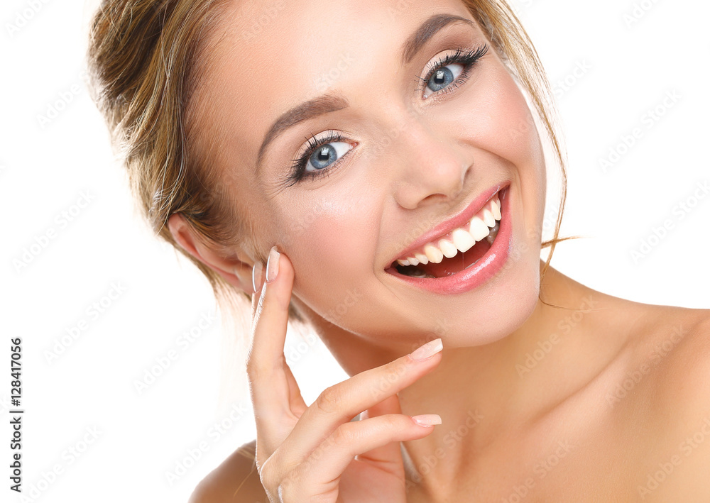 Young woman touching her face isolated on white background Young woman touching her face isolated on white background
