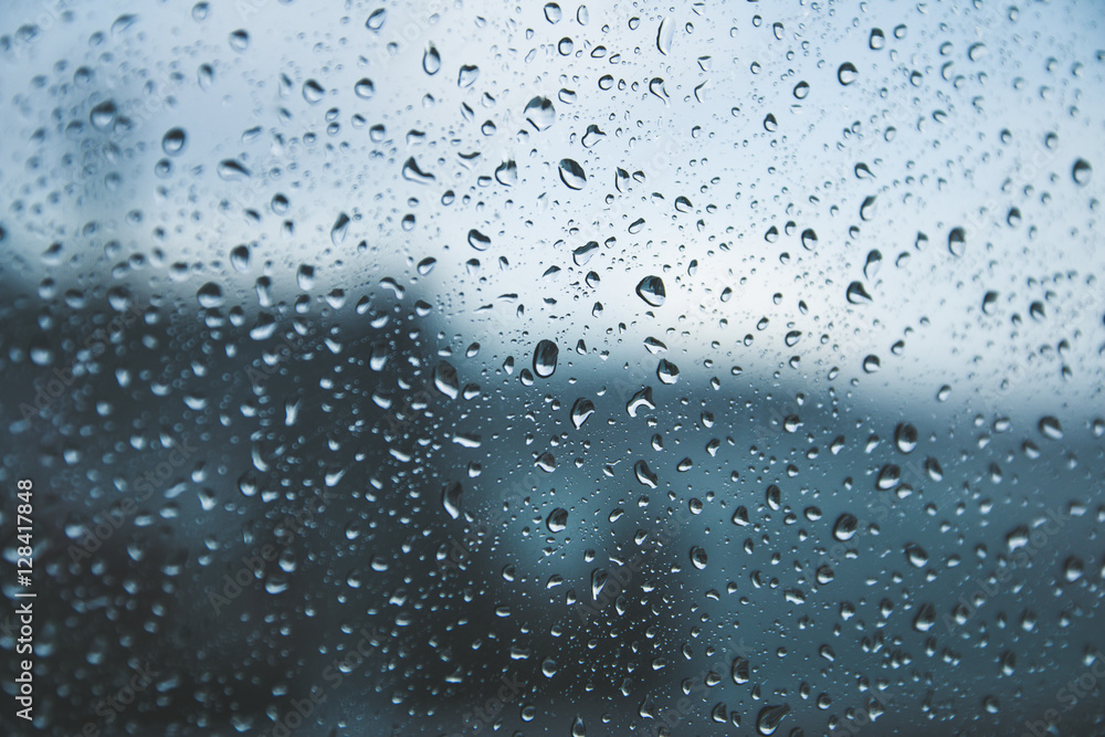raining on the glass off window ferry boats for background.