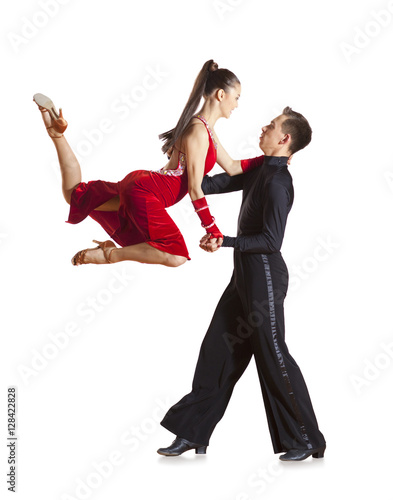 Beautiful couple in the active ballroom dance isolated