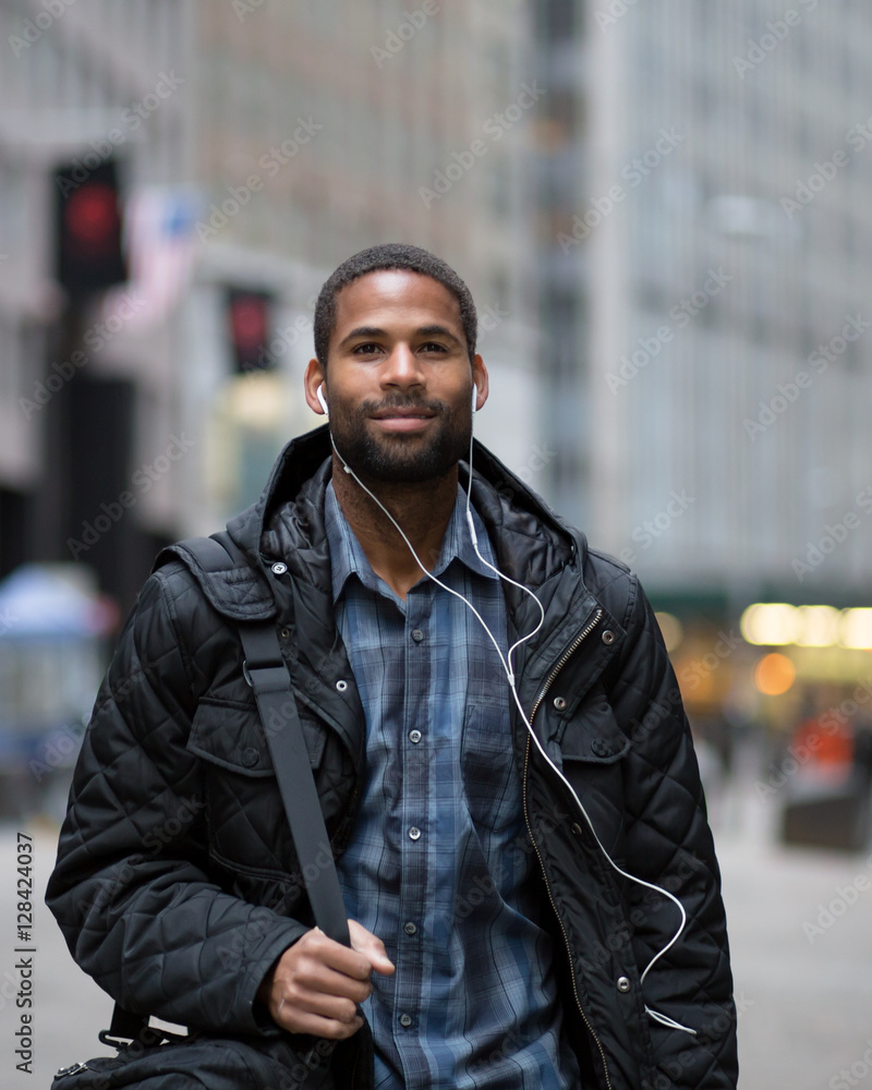 Attractive young African American man commuting to work Attractive young African American man commuting to work
