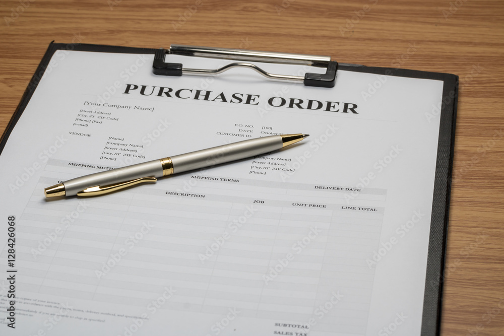 Close up of purchase order form with pen / selective focus Close up of purchase order form with pen / selective focus