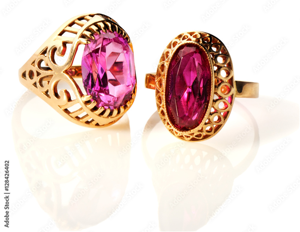 Fototapeta premium Two golden rings over white