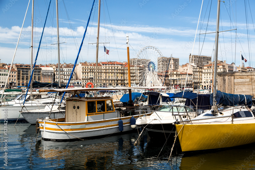 Boats in the harbor of Marseille, France on a spring day. Boats in the harbor of Marseille, France on a spring day.