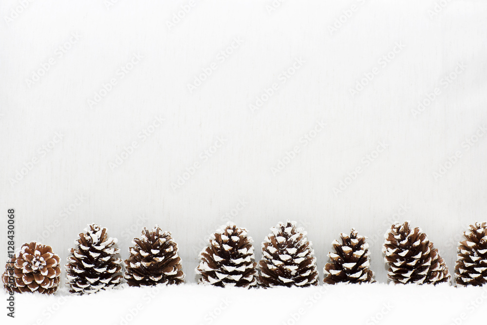 Christmas light background has cones. The texture of the carpet with a soft pile and linen fabrics. Christmas light background has cones. The texture of the carpet with a soft pile and linen fabrics.