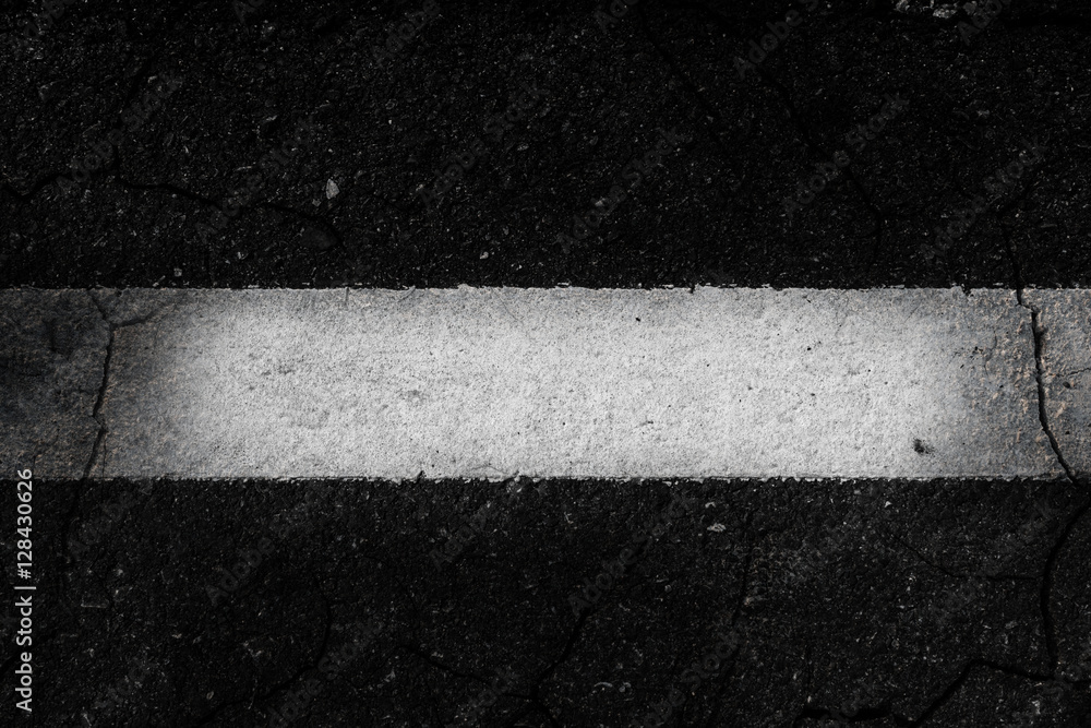 Fototapeta premium Crack asphalt the white line background.