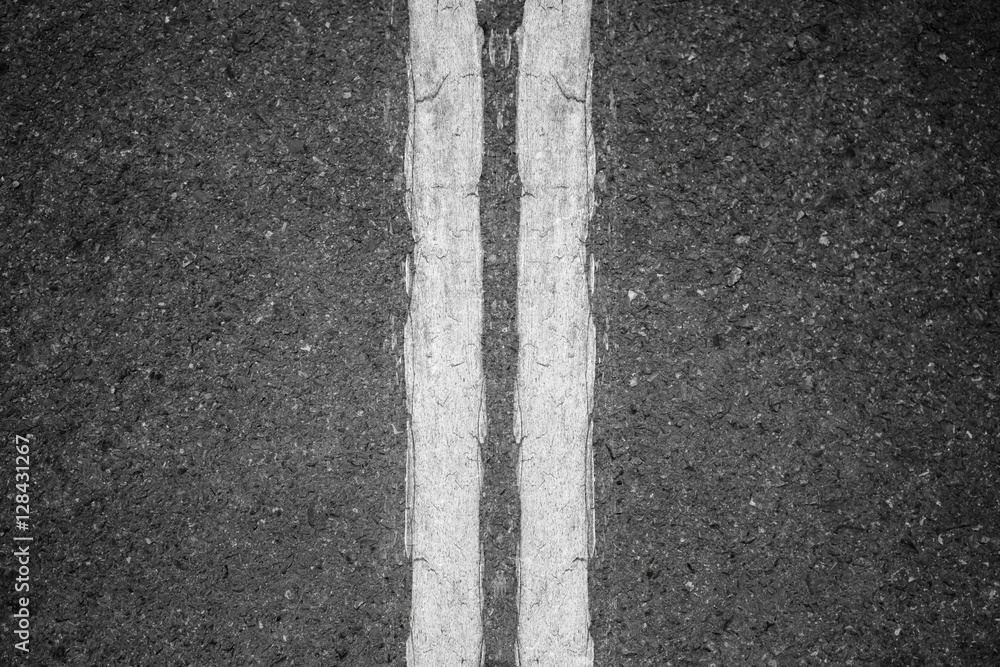 Fototapeta premium Double whit lines on asphalt background.