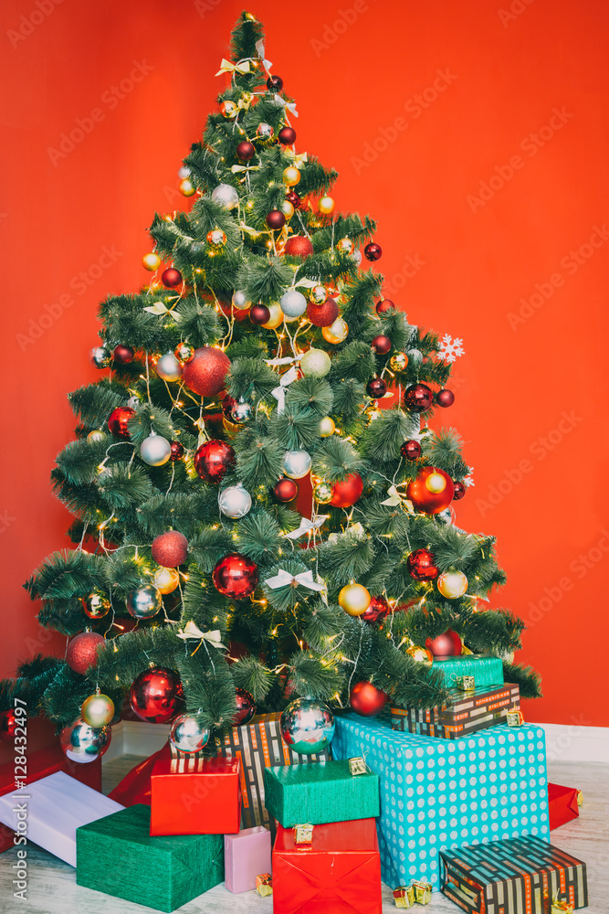 Beautiful Christmas living room with decorated Christmas tree and gifts. The idea for postcards. Soft focus. Shallow DOF