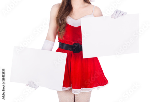 woman wearing santa claus clothes with blank sign on white backg