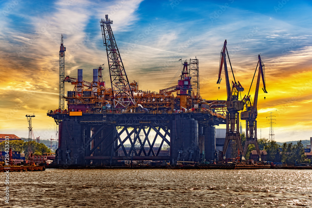 Oil rig under construction at sunset in Gdansk, Poland.