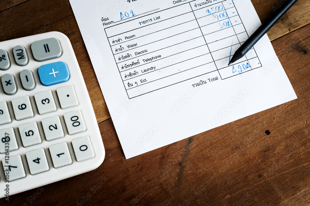 Utility bill with calculator and pencil, Save money Utility bill with calculator and pencil, Save money