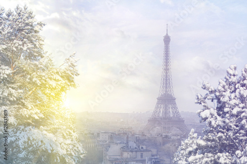 Christmas background : Aerial view of Paris cityscape with Eiffel tower at winter sunset in Paris. Vintage colored picture. Business, Love and travel concept © sergeialyoshin