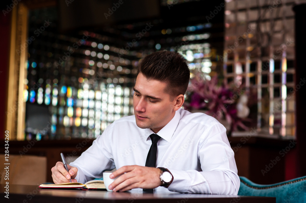 Businessman at the table Businessman at the table