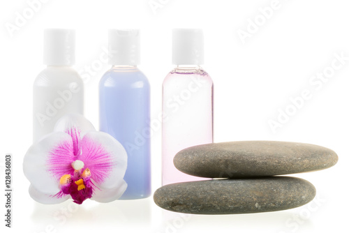 set of cosmetics and stones for spa treatments isolated