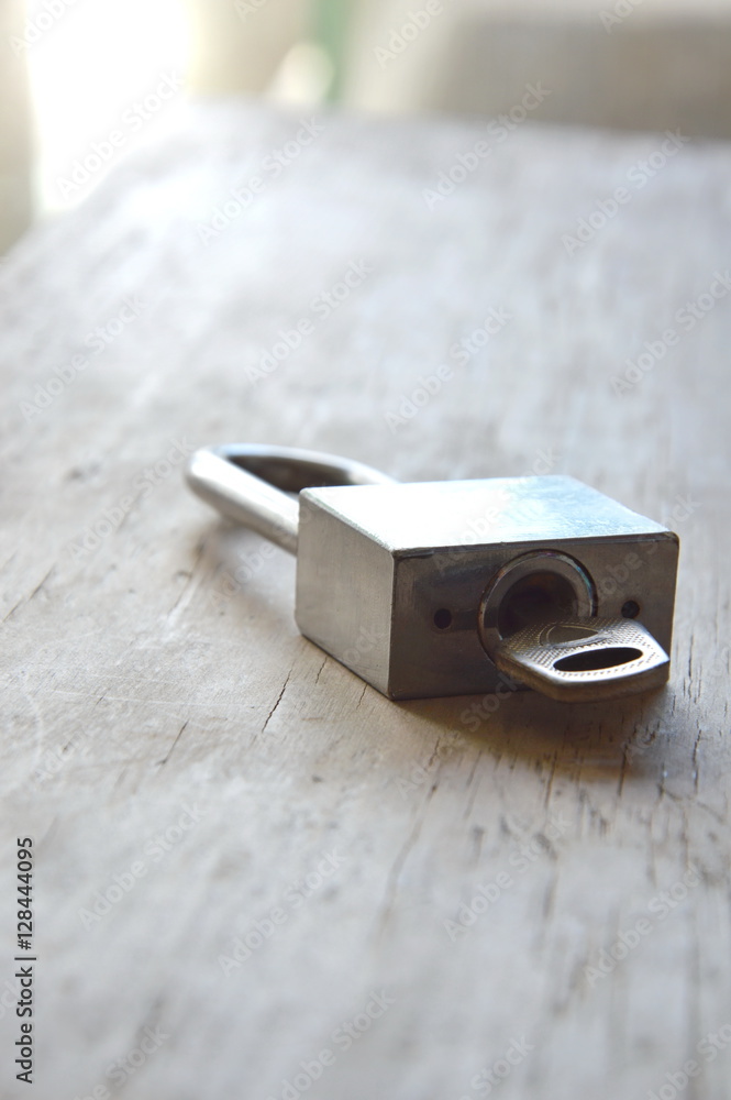 master key unlocked on wooden board master key unlocked on wooden board
