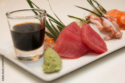  platter of sashimi sushi with tuna and salmon