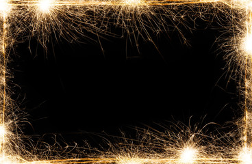 New year party sparklers frame on black background