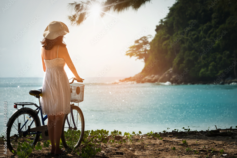 Charming woman in white dress walking bicycle enjoying blue sea and sunray
Holiday in tropical ,woman with sun hat relaxing and happy
Charming woman in white dress walking bicycle enjoying blue sea and sunray
Holiday in tropical ,woman with sun hat relaxing and happy