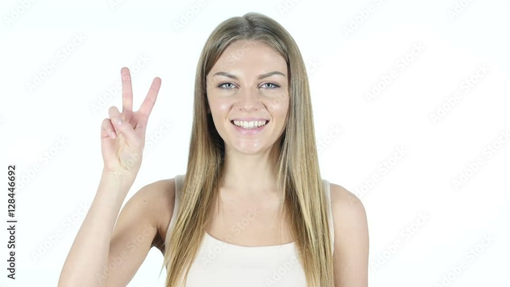 Woman Showing Victory Sign, White Background Woman Showing Victory Sign, White Background