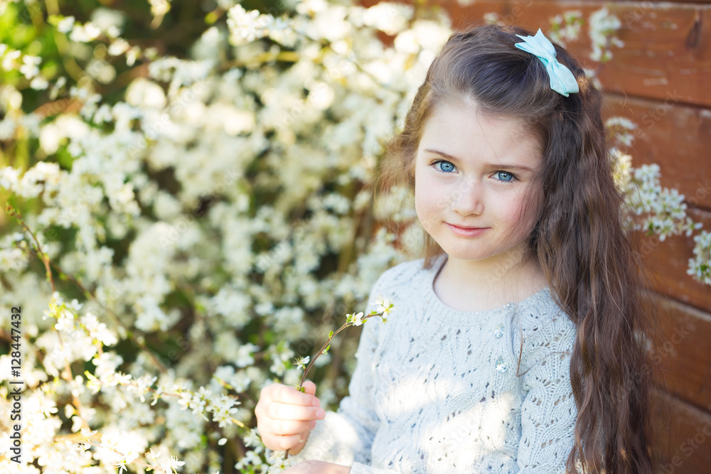 Portrait of a gorgeous little girl enjoying springtime in the su Portrait of a gorgeous little girl enjoying springtime in the su
