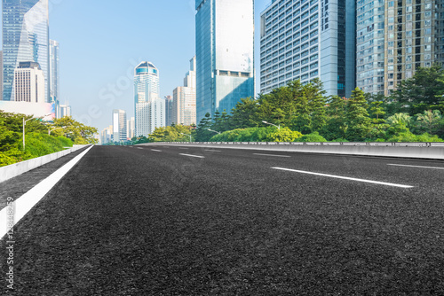 empty urban road through modern city of Shenzhen China.