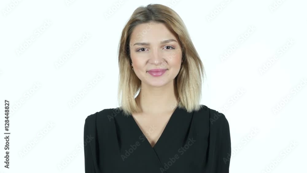 Flying Kiss by Cute Young Woman, White Background Flying Kiss by Cute Young Woman, White Background