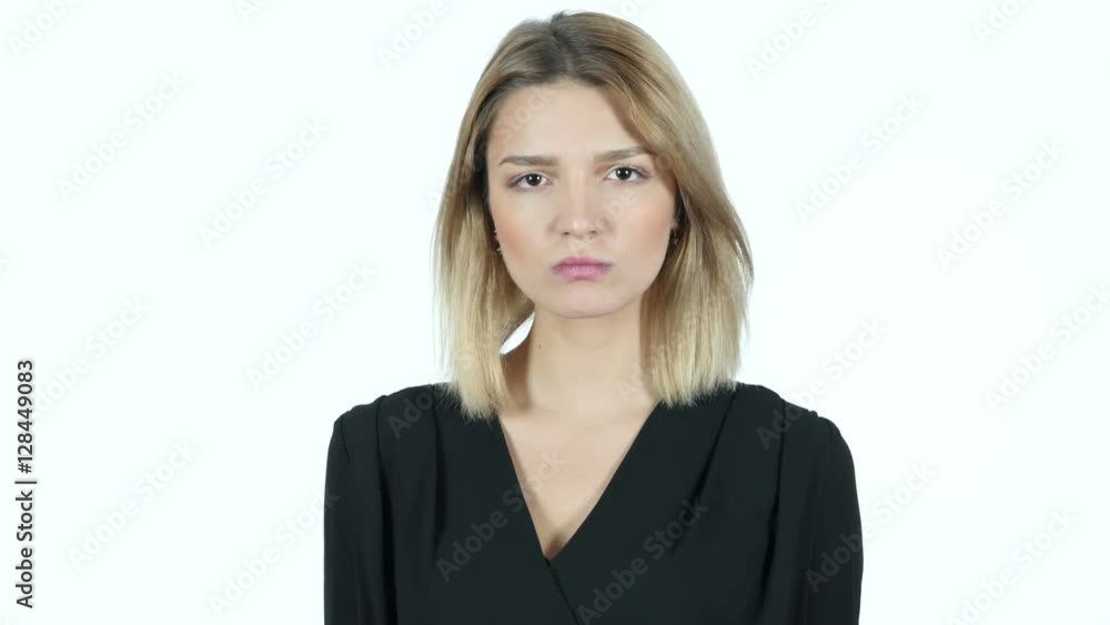 Angry Young Woman shows Middle Finger, White Background Angry Young Woman shows Middle Finger, White Background