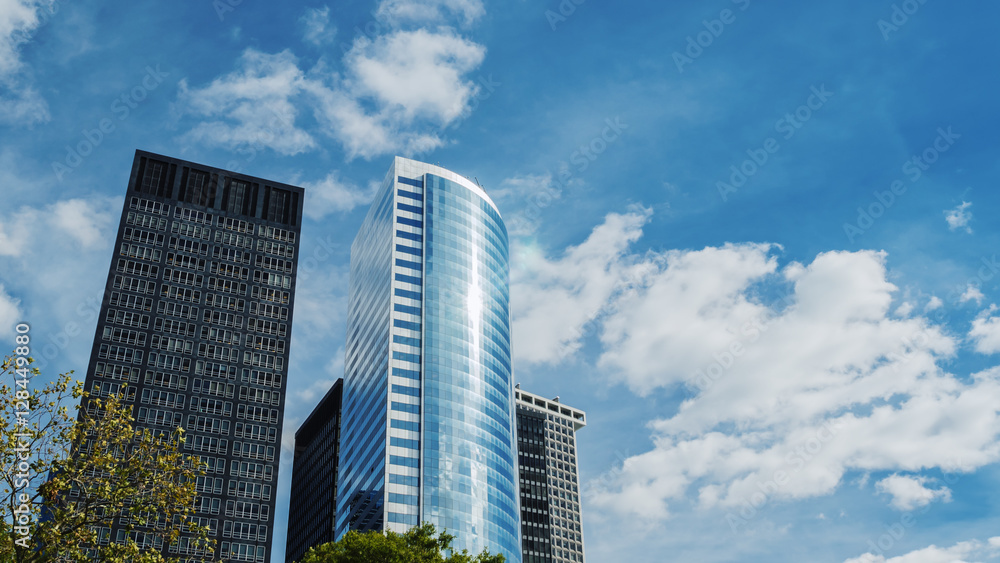 Glass skyscraper. High above the clouds, reflected in the windows. The office of your dreams