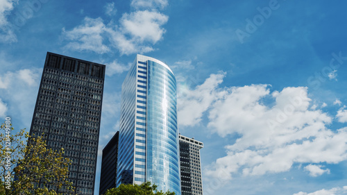 Glass skyscraper. High above the clouds, reflected in the windows. The office of your dreams © StockMediaProduction