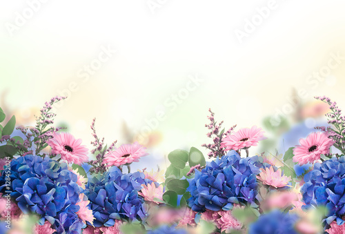 Amazing background with hydrangeas and daisies. Yellow and blue flowers on a ...
