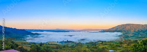 Sunrise with fog and mountain on morning, panorama