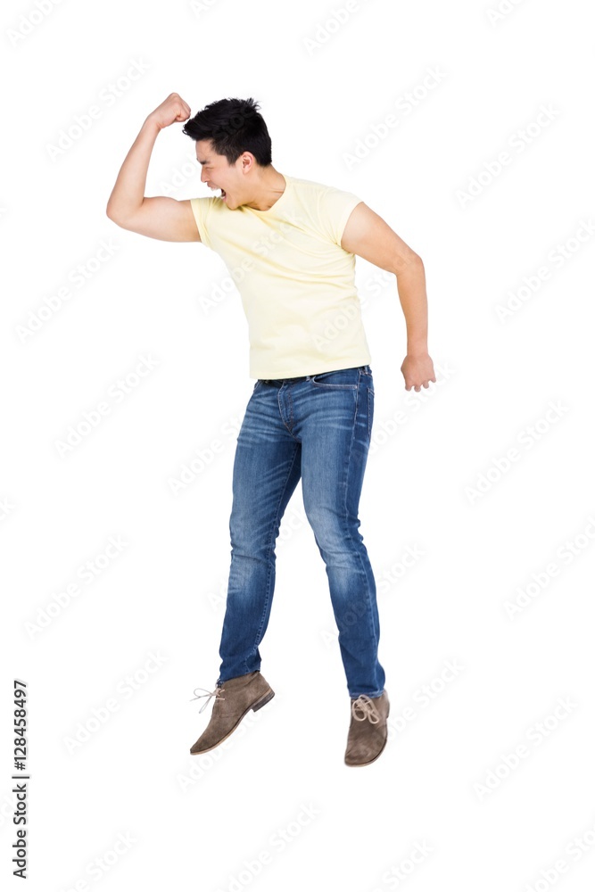 Happy man jumping in excitement