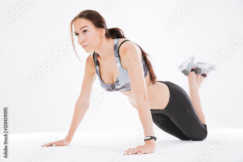Young fitness woman on the floor