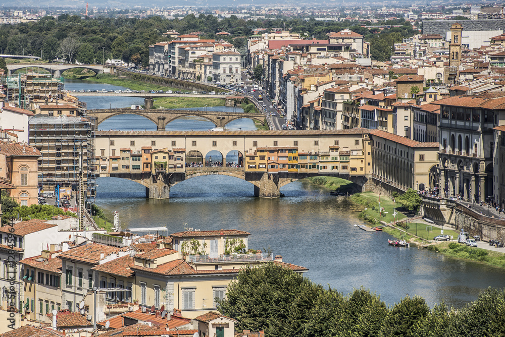 Florence, Italy- August 12, 2016: Cityscape of the city of Florence with the Ponte Vecchio overlooking the Arno River in Florence, Italy