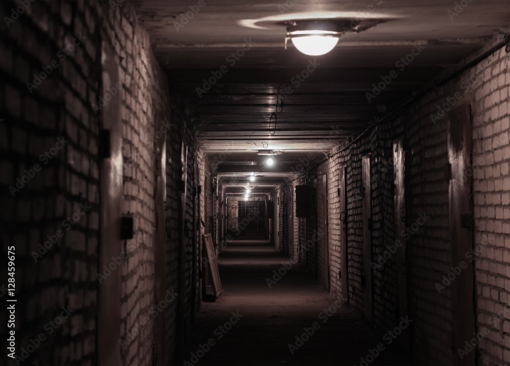 Long corridor in a basement Long corridor in a basement
