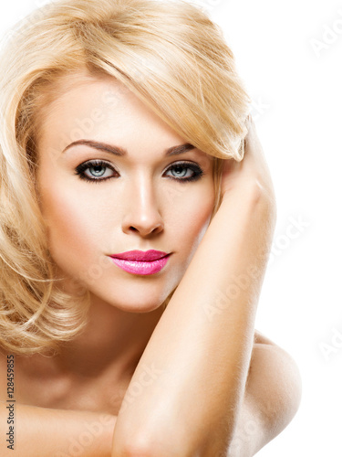 Portrait of  beautiful woman with blond  hair.  face of fashion