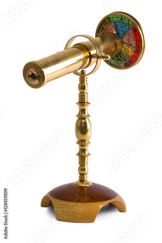 Antique kaleidoscope on white background