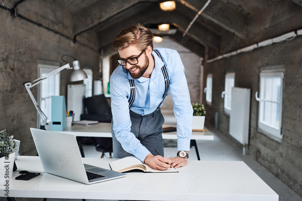 Hipster, businessman working at modern office Hipster, businessman working at modern office