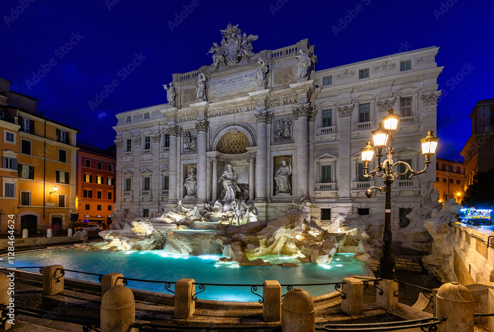 Fototapeta premium Night view of Rome Trevi Fountain (Fontana di Trevi) in Rome, Italy. Trevi is most famous fountain of Rome. Architecture and landmark of Rome