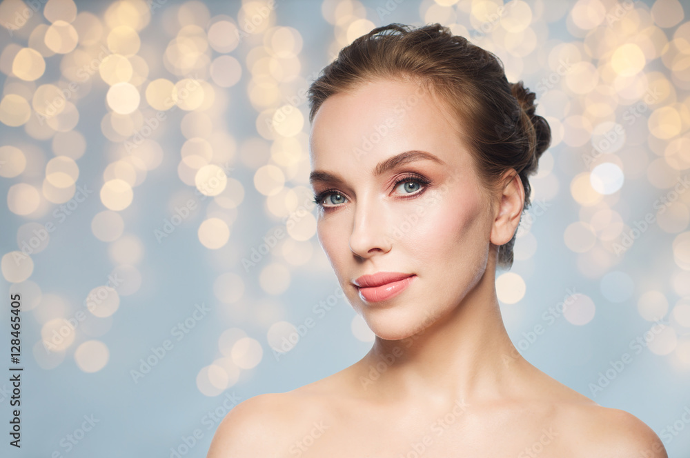 beautiful young woman face over white background beautiful young woman face over white background