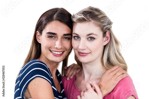 Portrait of smiling female friends hugging