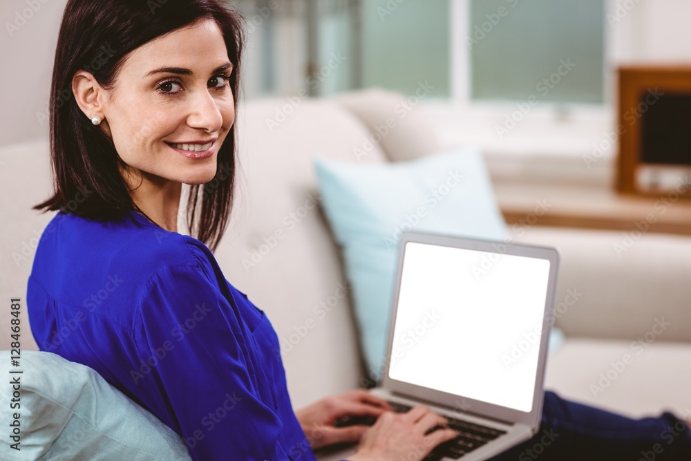 Portrait of smiling woman using laptop Portrait of smiling woman using laptop